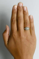 Half carat old european diamond rectangular engagement ring.