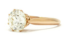 A large diamond 18k rose gold antique Victorian solitaire engagement ring.