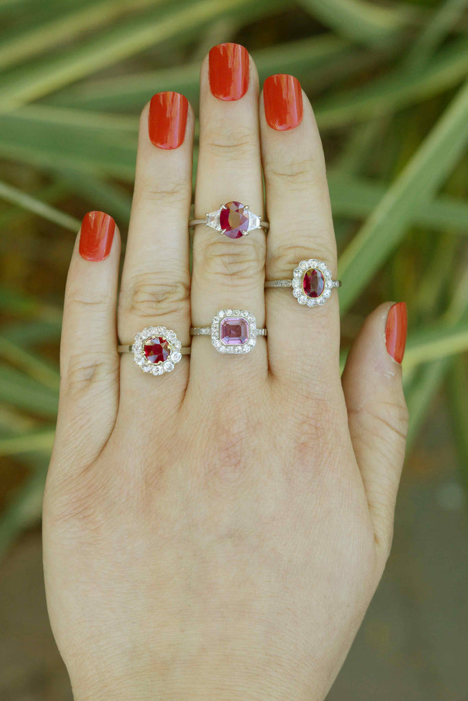 Bright red ruby engagement rings, as well as one with a  bright pink sapphire.