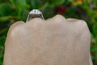 Rubies and diamonds stripe this Art Deco revival, platinum engagement ring.