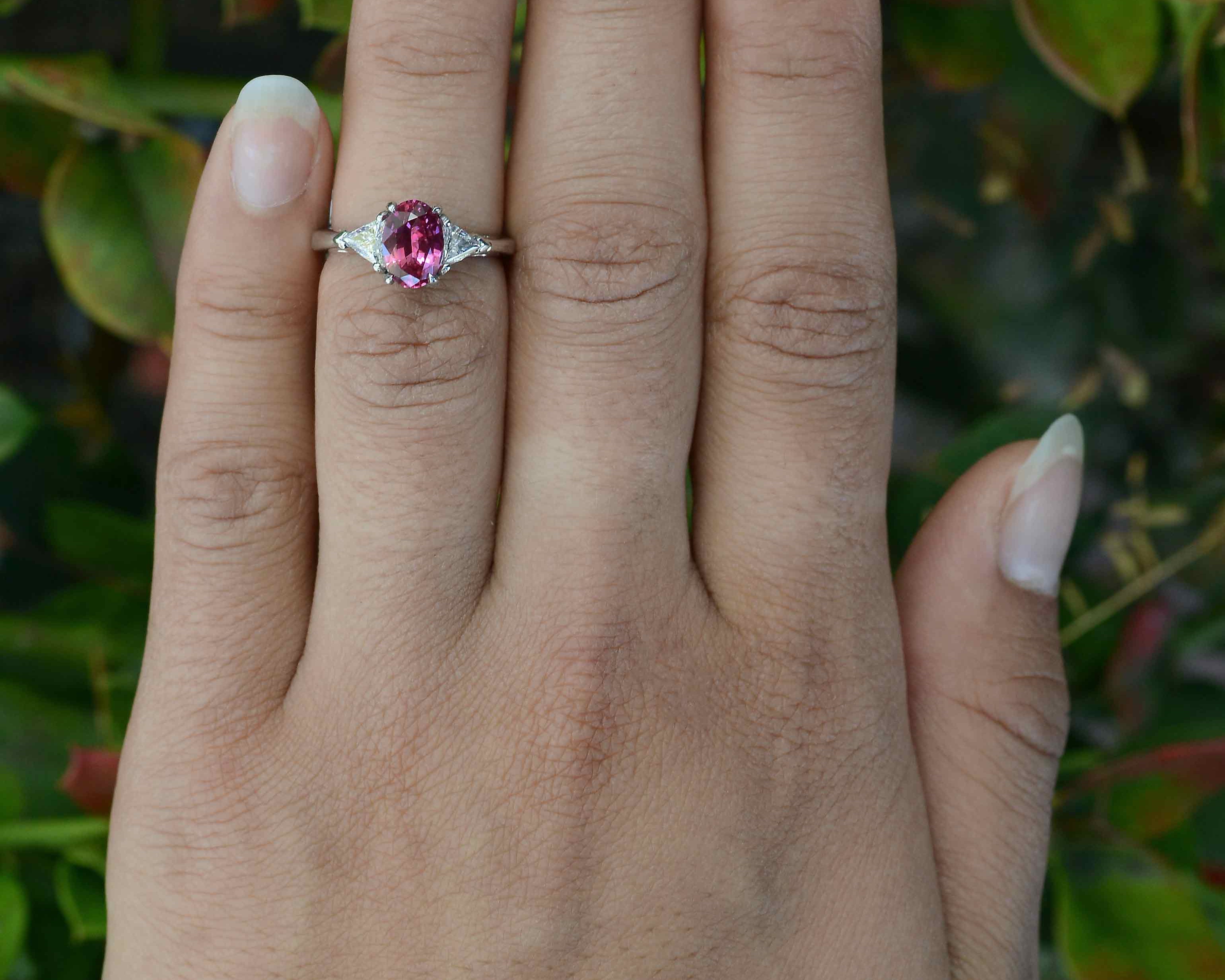 A vintage neo classical pink sapphire diamond platinum trinity engagement ring from the 1990s.