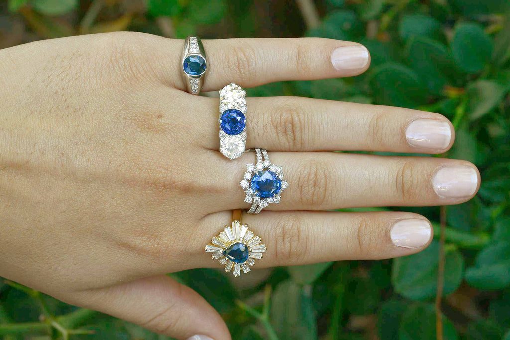 Antique blue sapphire diamond cluster wedding rings.