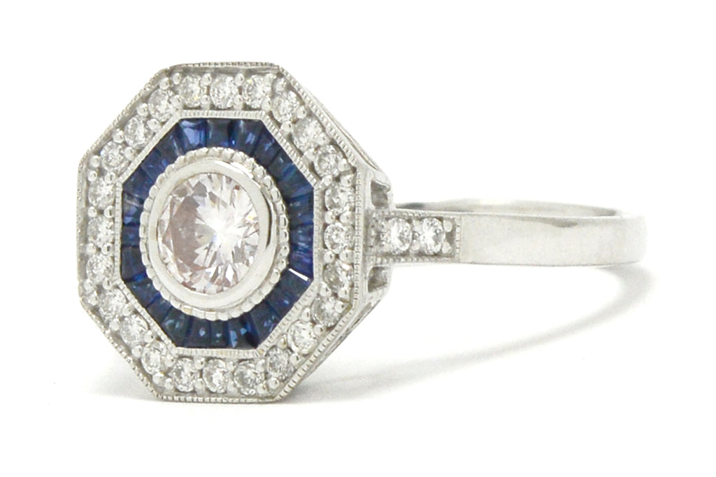 A round brilliant diamond, Art Deco revival octagon engagement ring.