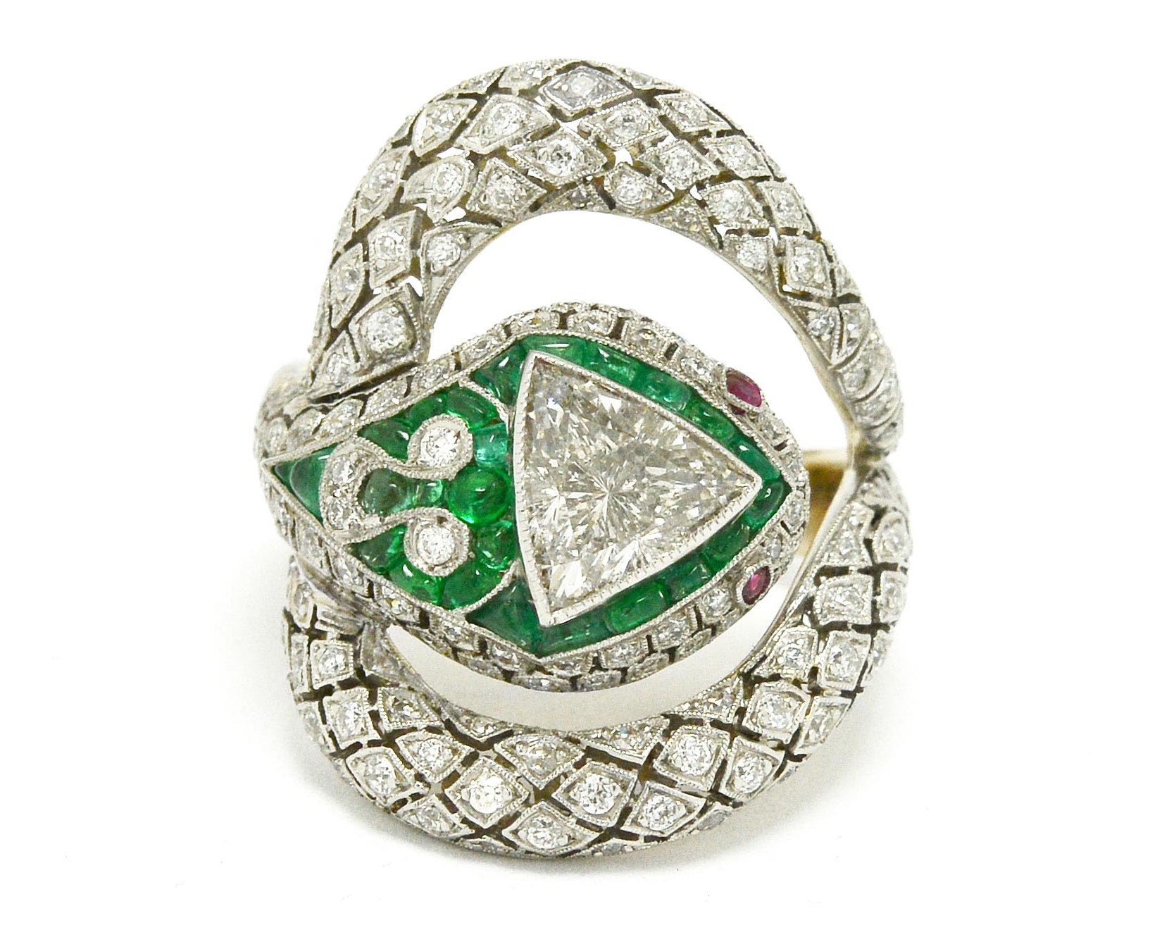 1 carat trillion cut diamond snake ring with emeralds and rubies.