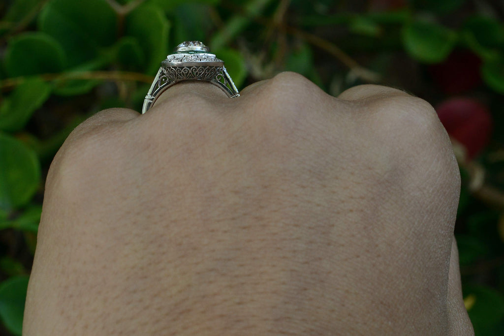 An antique diamond set in a platinum Art Deco revival ring setting.