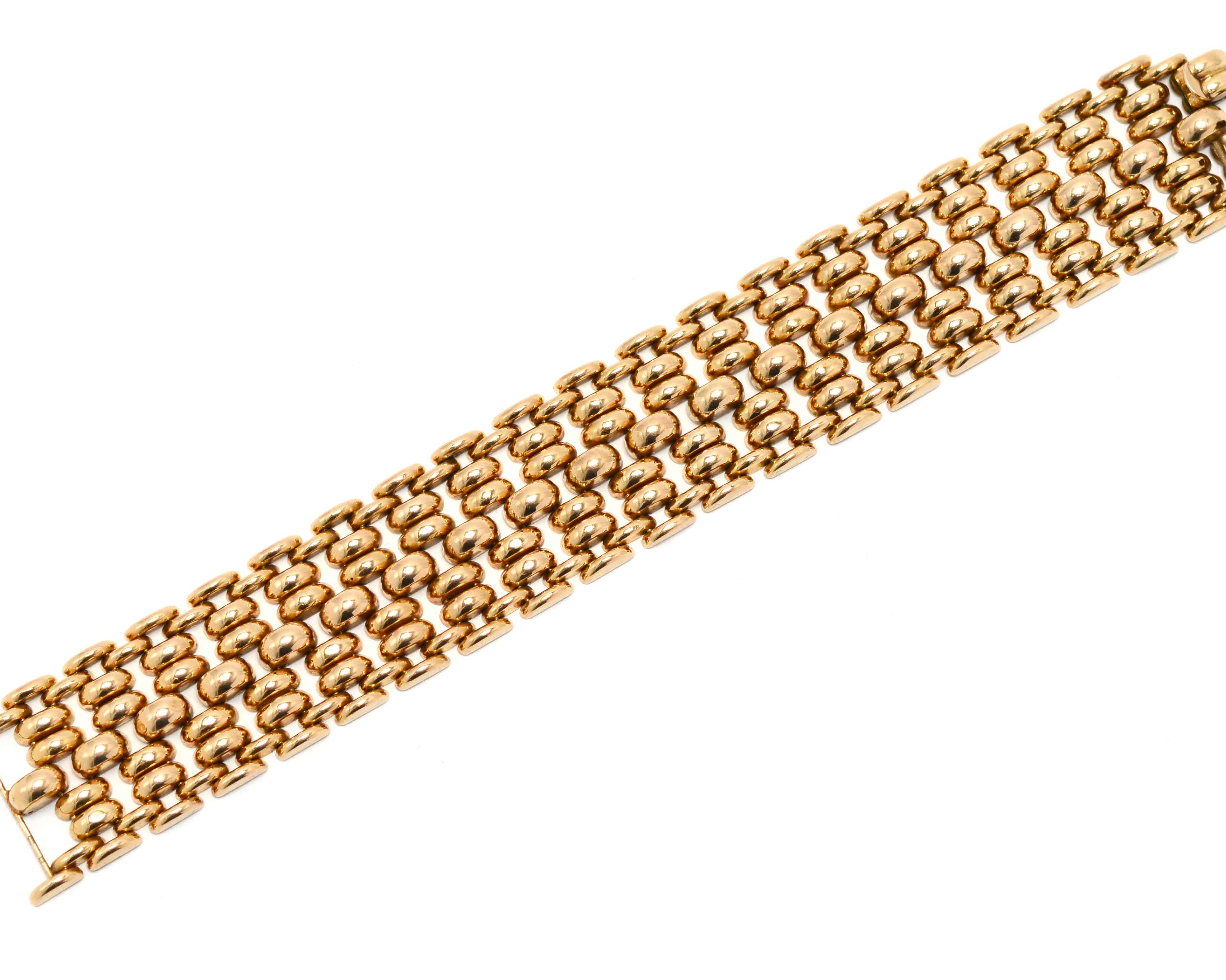 A 1940s, industrial design, tank tread gold bracelet.