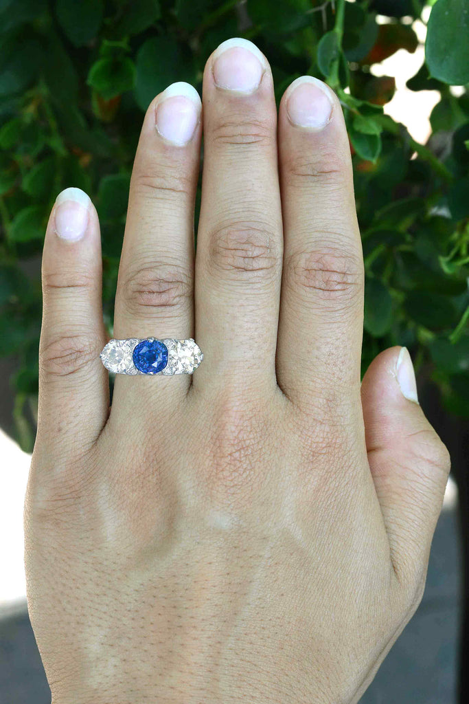 3 carat blue sapphire three stone engagement ring.