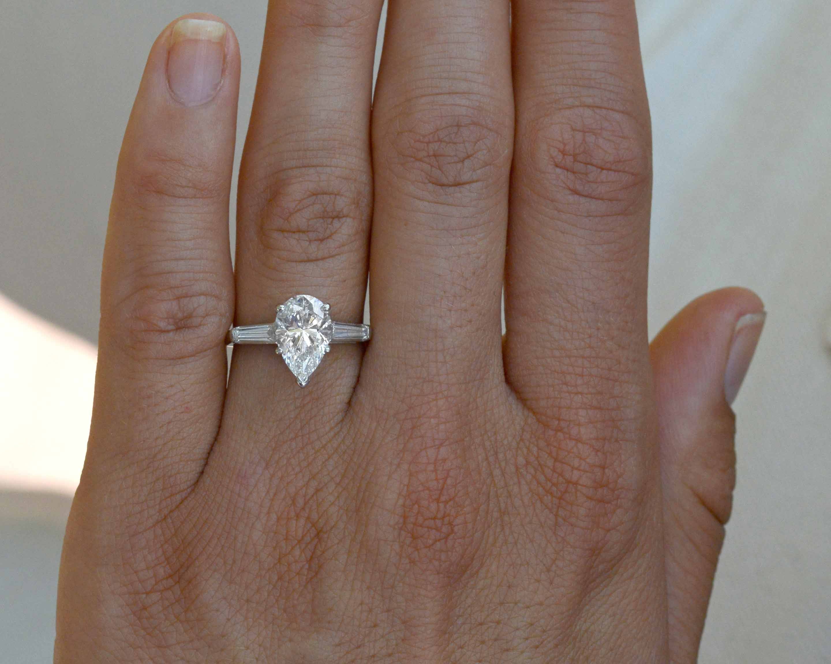 A GIA certified 2 carat natural diamond solitaire engagement ring.