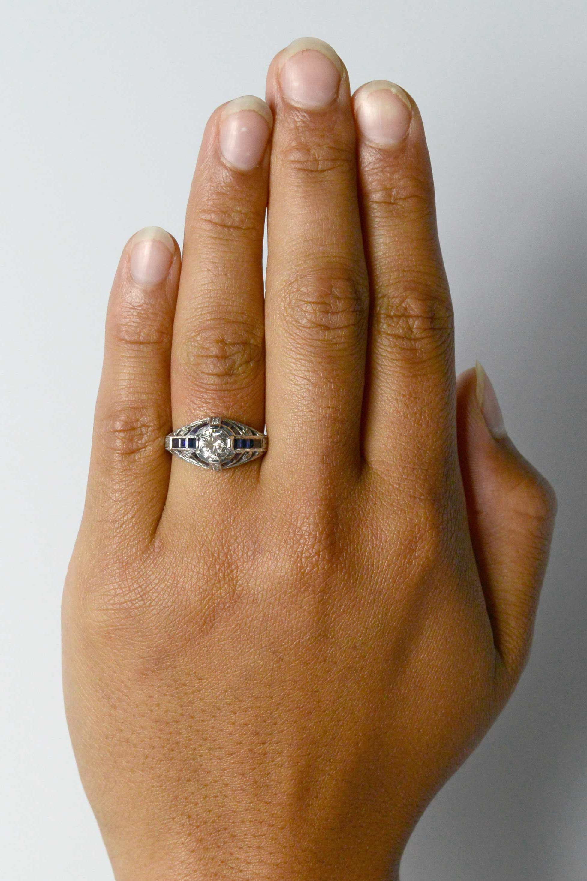 1 carat diamond Art Deco engagment ring with blue sapphires.